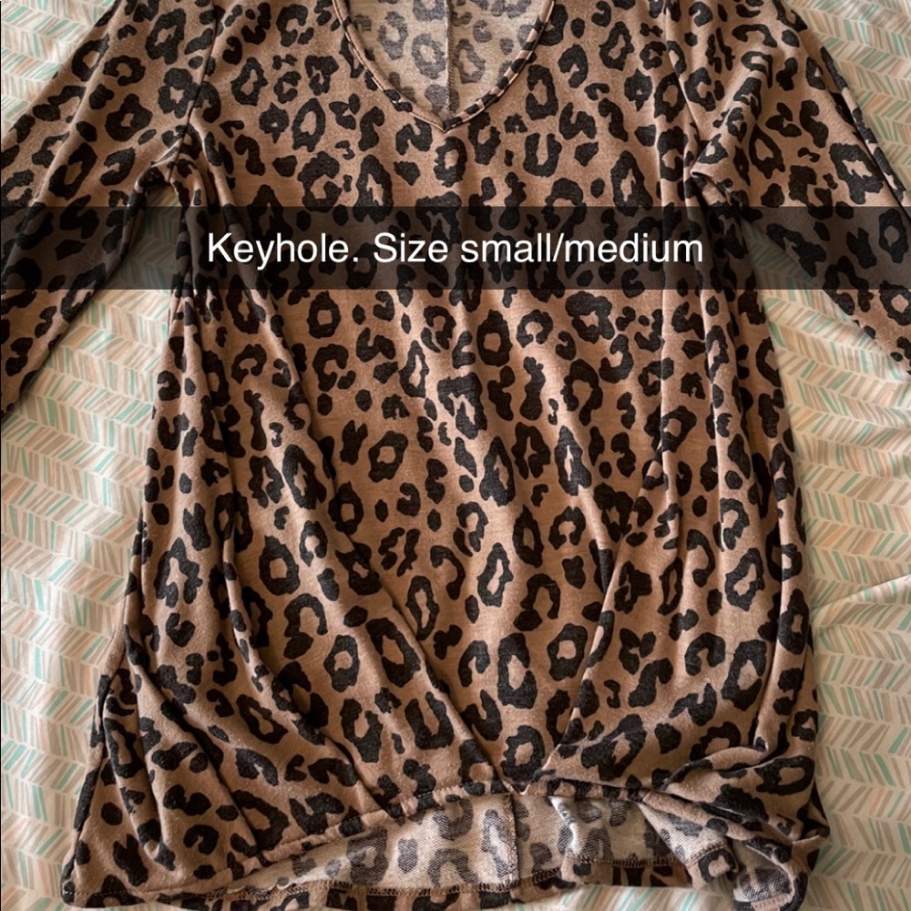 Boutique cheetah long sleeve keyhole top size small